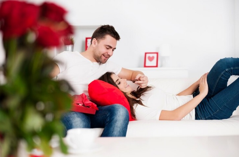 man feeding his woman